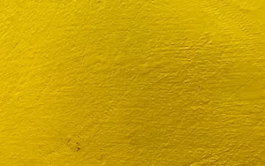 Textured Bright Yellow Stone Wall Wallpaper