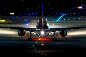 Thai Airways Airplane On Brilliant Runway Wallpaper