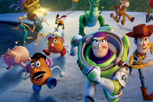 The Adventurous Run Of Toy Story 2 Characters Wallpaper