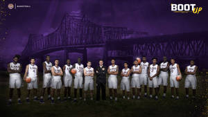 The Basketball Team Is Posing For A Picture Wallpaper