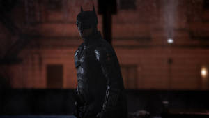 The Batman Drenched In Rain Wallpaper