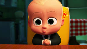 The Boss Baby In Yellow Chair Wallpaper