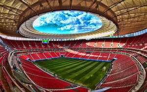 The Buzzing Jungle Of Football: The Mane Garrincha Stadium Wallpaper