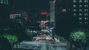 The Charming City Lights Of The Night Street Wallpaper