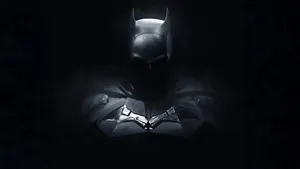 The Dark Knight Looks Out Over Gotham City Wallpaper