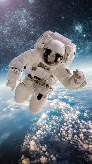 The Earth And An Astronaut Iphone Wallpaper