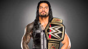 The Electrifying Wwe Logo On A Dynamic Red Background Wallpaper