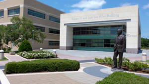 The Facade Of The Bush School At Texas A&m University Wallpaper