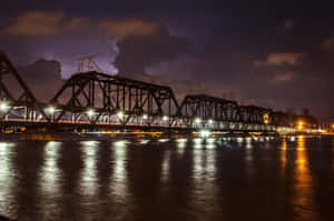 The Fort Madison Bridge Spans The Mississippi River Wallpaper