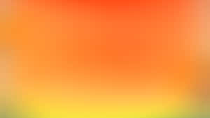 The Glowing Hue Of A Bright Light Orange Wallpaper