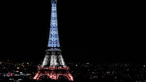 The Iconic Eiffel Tower: Unforgettable Symbol Of Paris Wallpaper