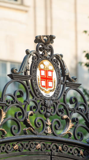 The Iconic Logo Of Brown University At The College Gate Wallpaper