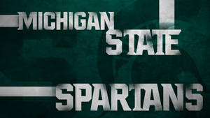 The Iconic Spartan Statue Standing Tall In The Campus Of Michigan State University Wallpaper