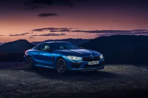 The New Bmw M8 Coupe Is Shown In The Evening Light Wallpaper