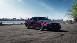 The Nissan Skyline R33 Gtr- A Powerful Racing Machine Wallpaper