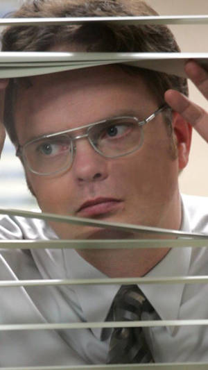 The Office Dwight Through Blinds Wallpaper