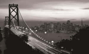 The San Francisco Skyline At Night As Seen In Black And White Wallpaper