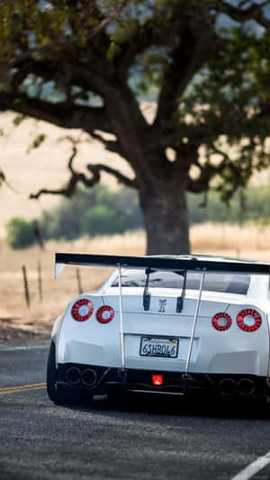 The Sleek Interior Of A Nissan Skyline Wallpaper