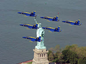 The Statue Of Liberty Is In The Water Wallpaper