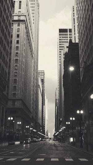 The Thrill Of City Life In Black And White Wallpaper