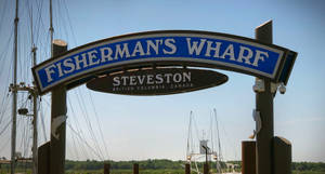 The Vibrant Entrance To Fisherman's Wharf In Steveston Wallpaper