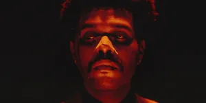 The Weeknd's After Hours Album Artwork Featuring A Bold And Enigmatic Portrait Wallpaper