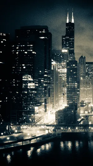 The Windy City: An Incredible Skyline Of Chicago, Il At Night Wallpaper