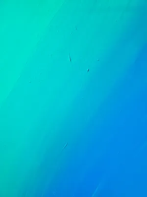 This Bright Turquoise Iphone Looks Great In The Sunshine! Wallpaper