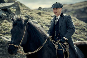 Thomas Shelby Riding A Horse Wallpaper