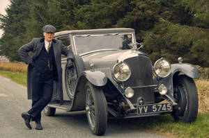 Thomas Shelby With Old Classic Car Wallpaper