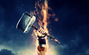 Thor Lets Loose A Mighty Mjolnir Strike. Wallpaper