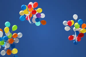 Three Cluster Balloons In Sky Wallpaper