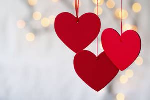 Three Hung Hearts Valentines Desktop Wallpaper