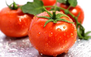 Three Red Ripe Tomato Fruits Wallpaper