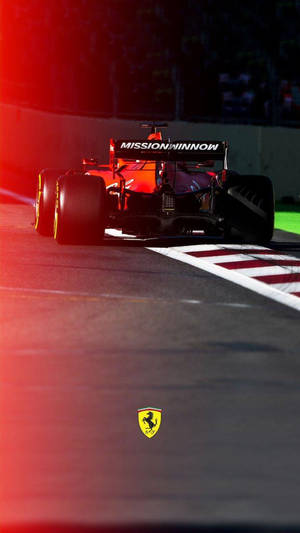 Thrilling Race Moment With The F1 Phone By Scuderia Ferrari Wallpaper