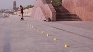 Thrilling Rollerblading Practice At Skate Park Wallpaper