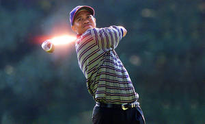 Tiger Woods Powerful Golfing Desktop Wallpaper