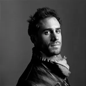 Timeless Elegance - A Black And White Portrait Of Actor Joseph Fiennes Wallpaper
