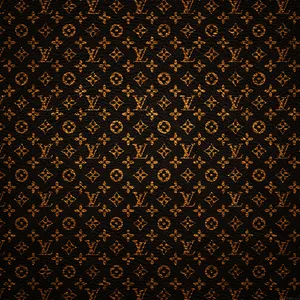Timeless Luxury Style With The Louis Vuitton Pattern Wallpaper