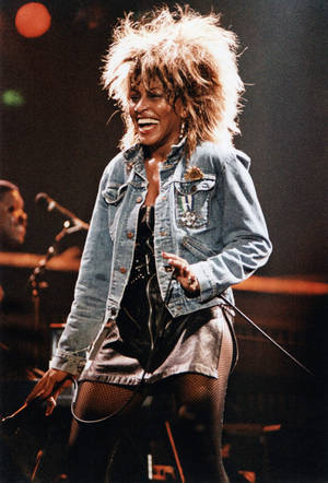 Tina Turner Glows At Punk Rock Performance Wallpaper