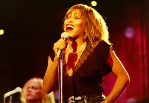 Tina Turner Live Song Performance Wallpaper