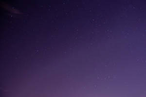 Tiny Stars In Purple Night Sky Wallpaper