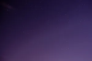 Tiny Stars In Purple Night Sky Wallpaper