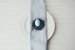 Tiny White Easter Egg On Plate Wallpaper