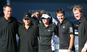 Todd Woodbridge With Players And Friends Wallpaper