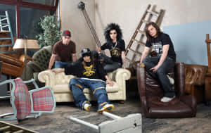 Tokio Hotel Band Membersin Disheveled Room Wallpaper