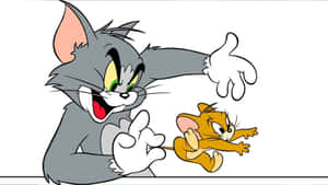 Tom And Jerry Sharing A Laugh Wallpaper