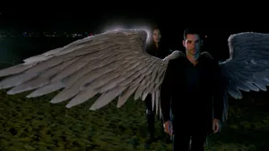 Tom Ellis As Lucifer Devil Showing His Wings Wallpaper