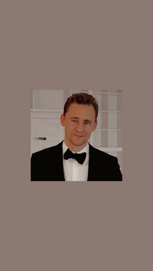 Tom Hiddleston In A Bow Tie Wallpaper