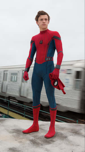 Tom Holland As Spider Man In Spider Man Homecoming Wallpaper